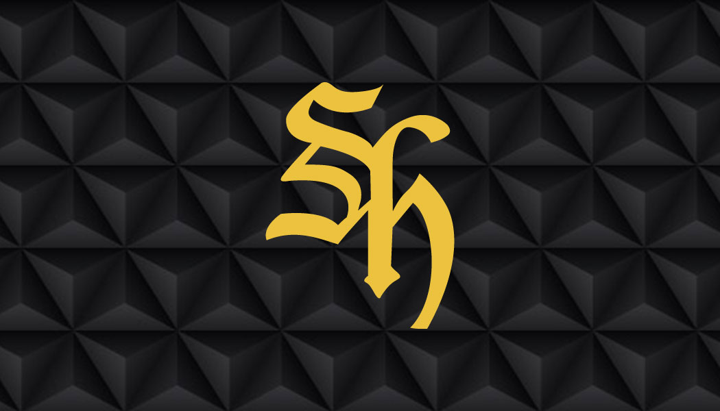 Black geometric surface with the Spencer H gold monogram